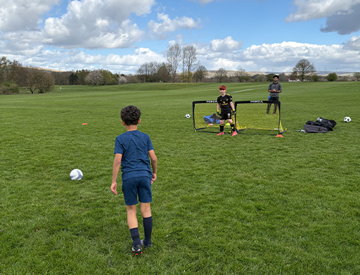 Coaching session under way on the grass.